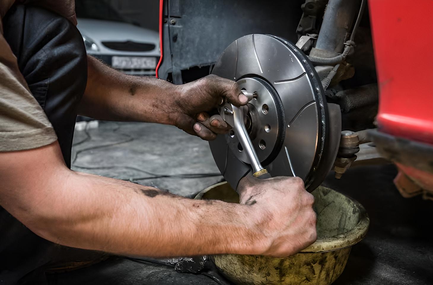 Mechanic performing brake drum resurfacing in Northern Beaches Sydney.