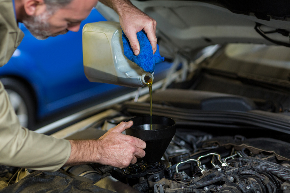 mechanic performing brake fluid replacement in Northern Beaches workshop
