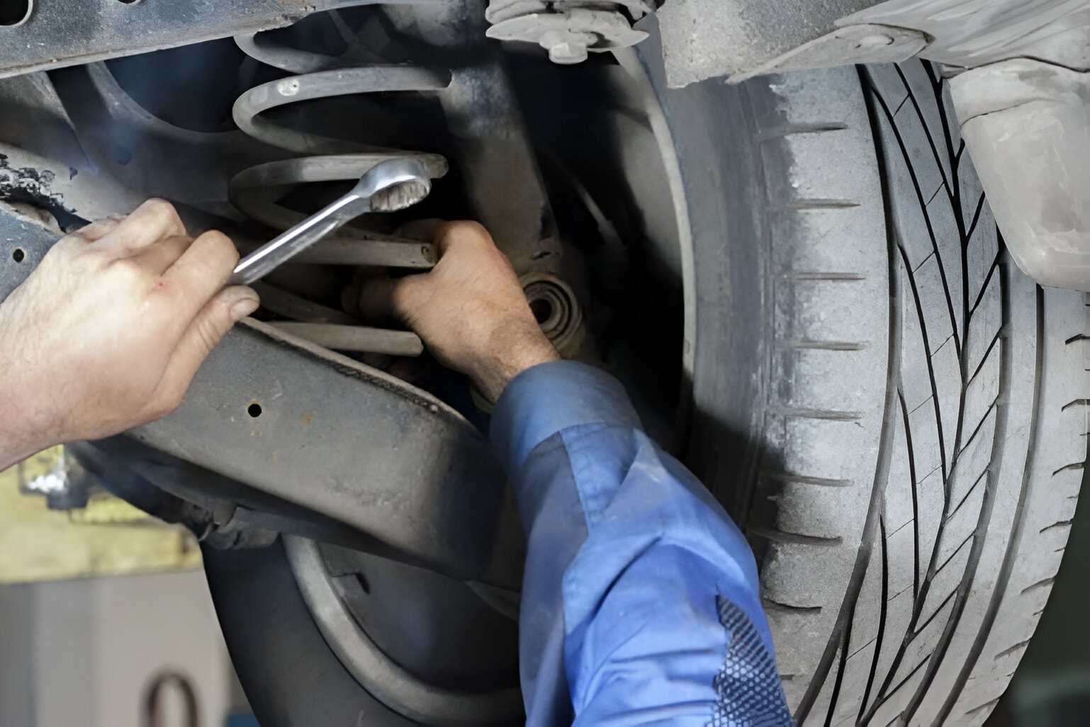 Vehicle with sagging springs showing symptoms of weak or worn suspension