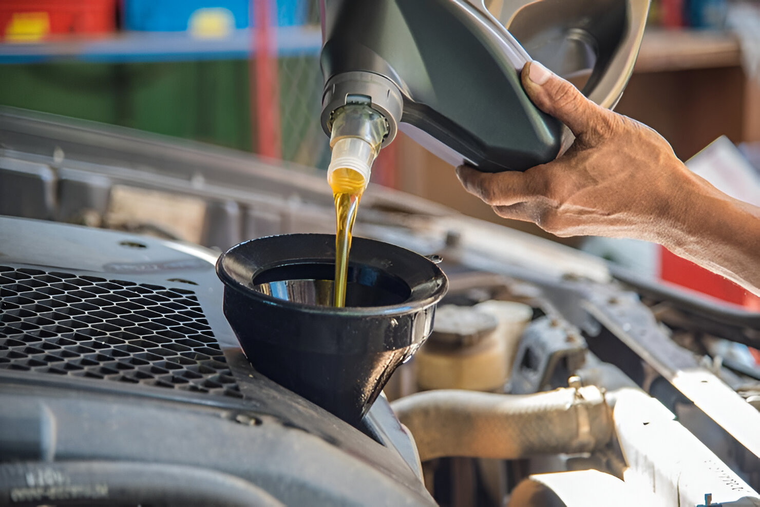 Changing engine oil during professional car service